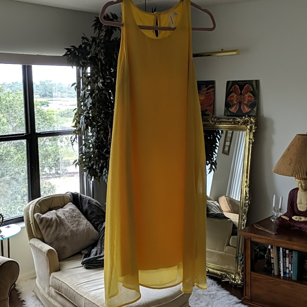 Yellow free flow dress with slip